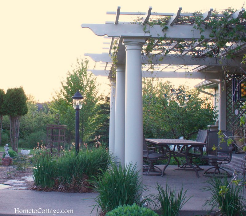 HometoCottage.com pergola from side toward early sunset